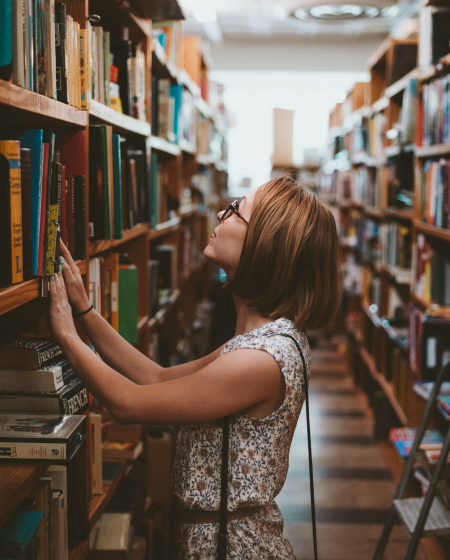 girl chooses a book